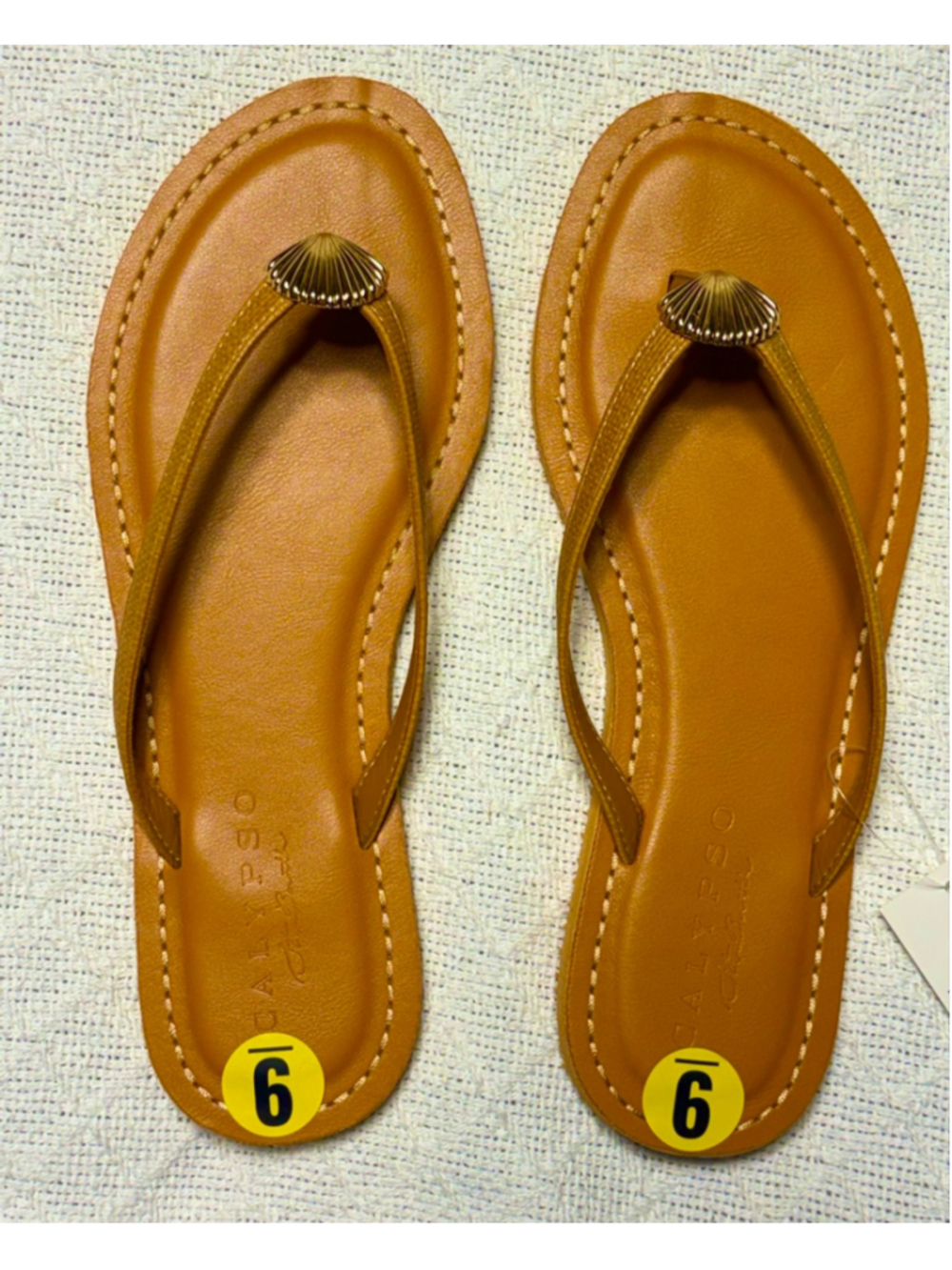 Calypso St. Barth Tan Leather Shell-Accented Thong Sandals